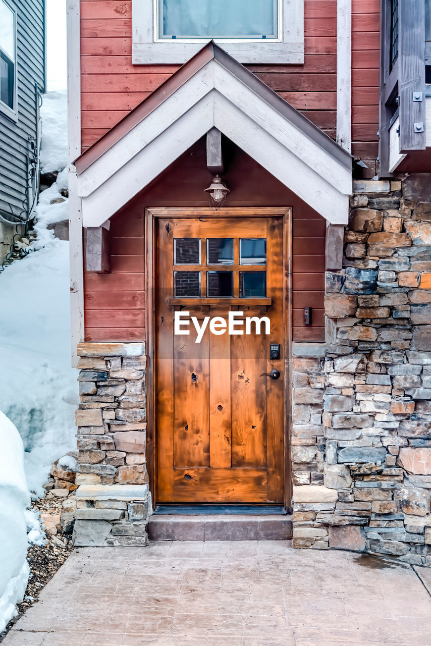 CLOSED DOOR OF BUILDING IN WINTER