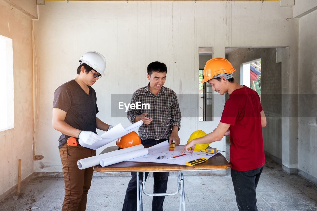 side view of man working at workshop