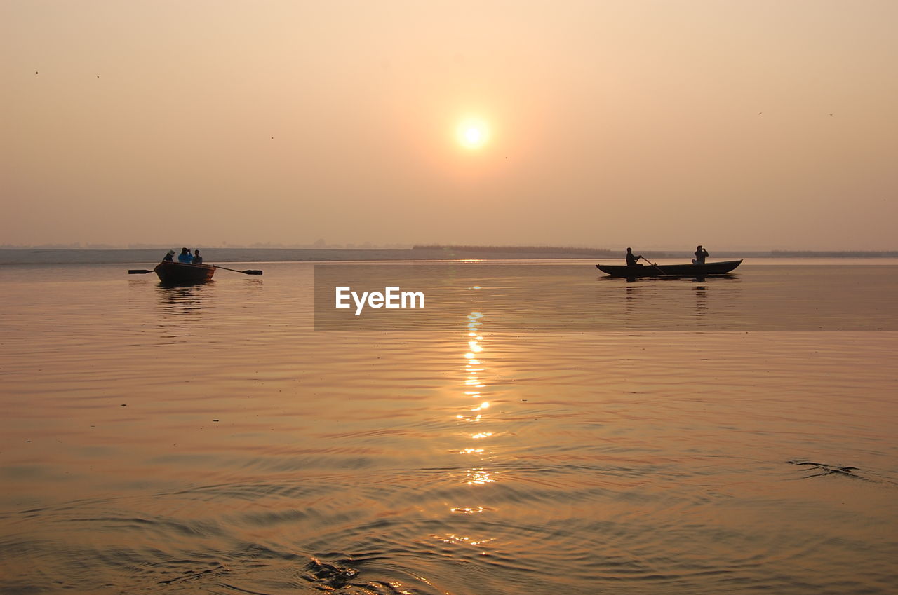 SCENIC VIEW OF SEA DURING SUNSET