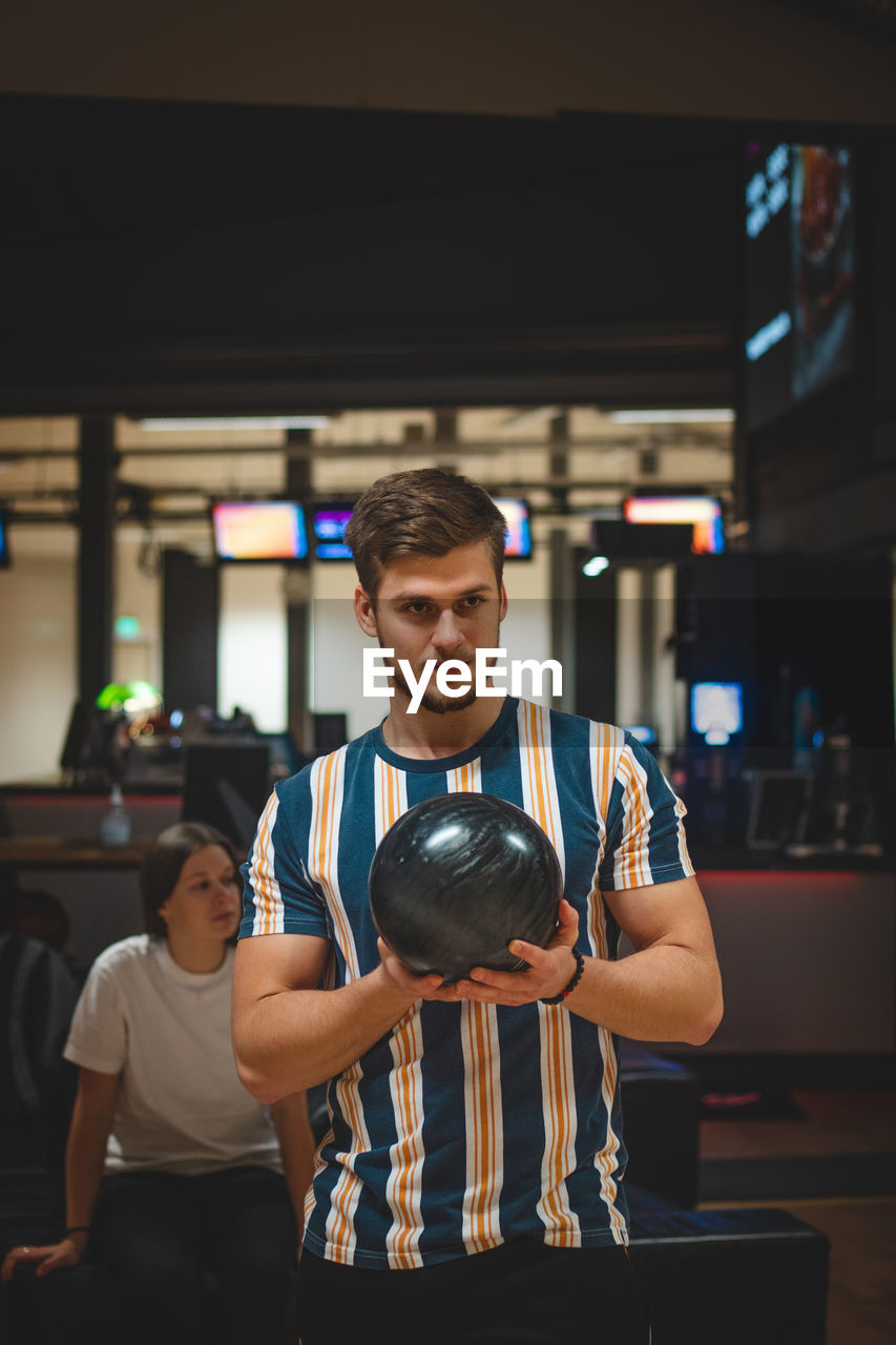 Professional bowler throws his throw and is in position to watch his ball. bowling life. 