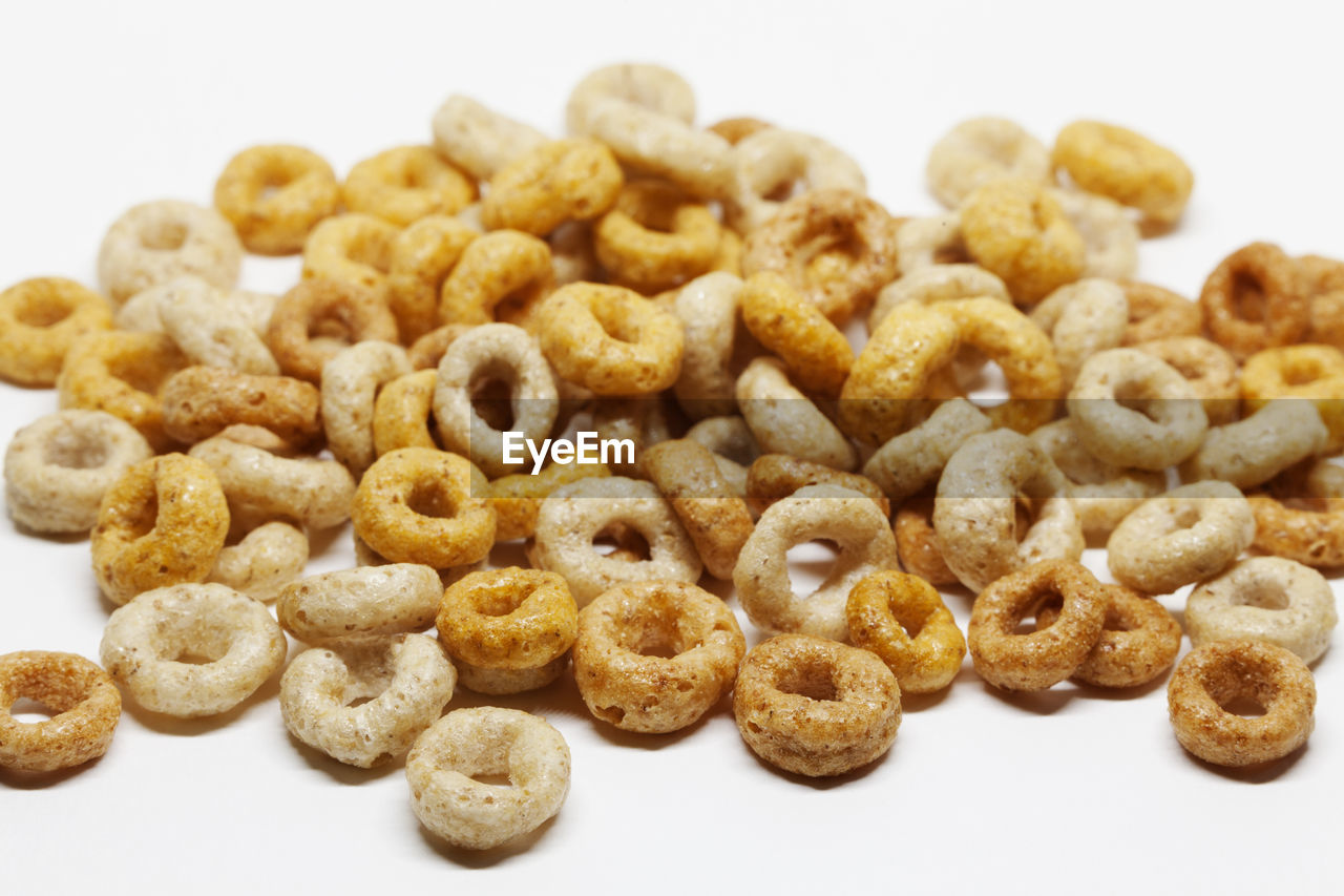 CLOSE-UP OF COOKIES AGAINST BLACK BACKGROUND