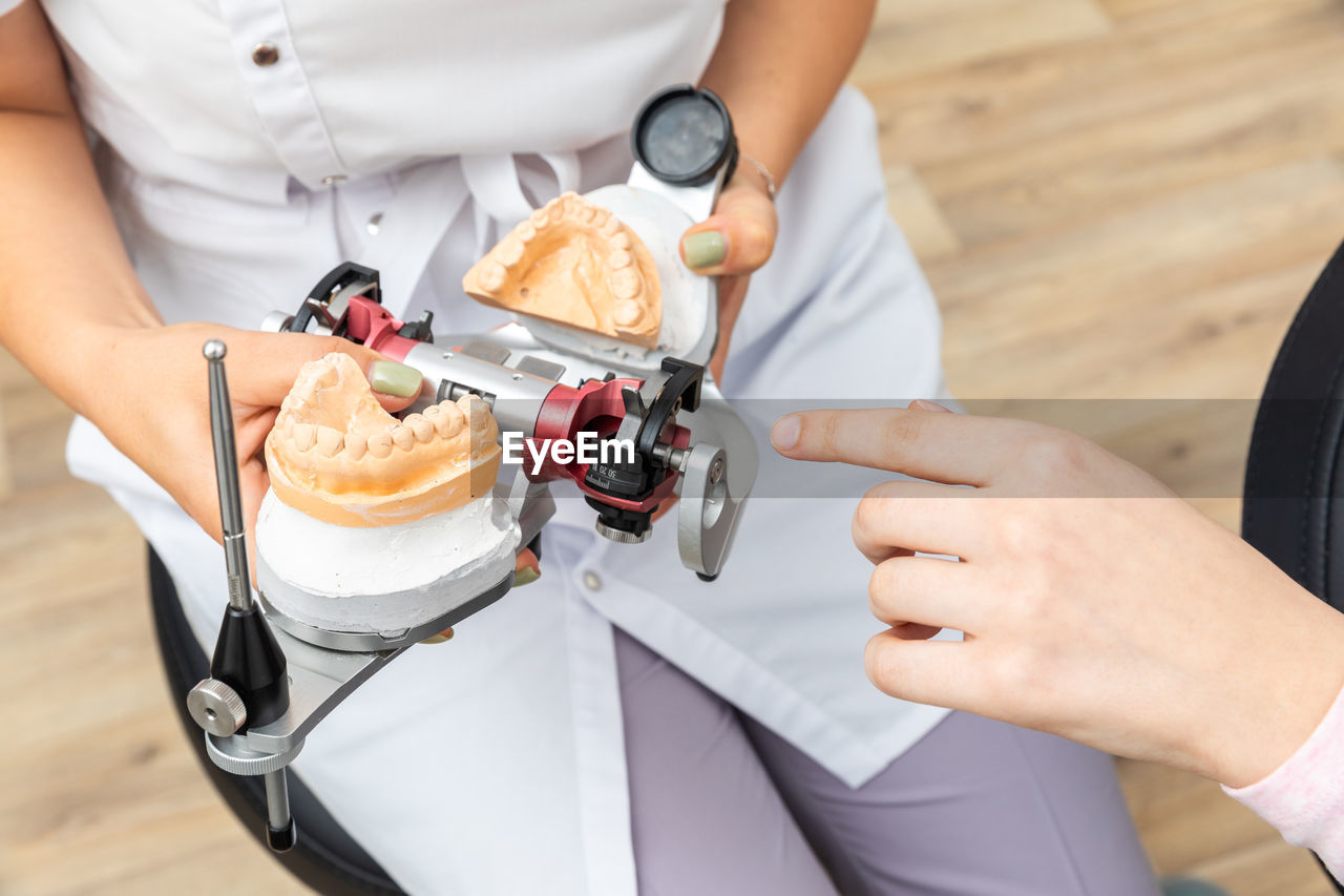 midsection of man holding food