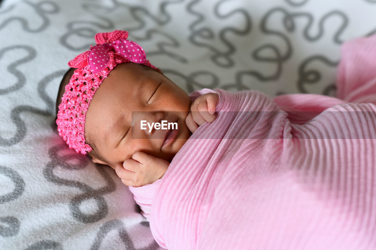 CLOSE-UP OF BABY BOY SLEEPING