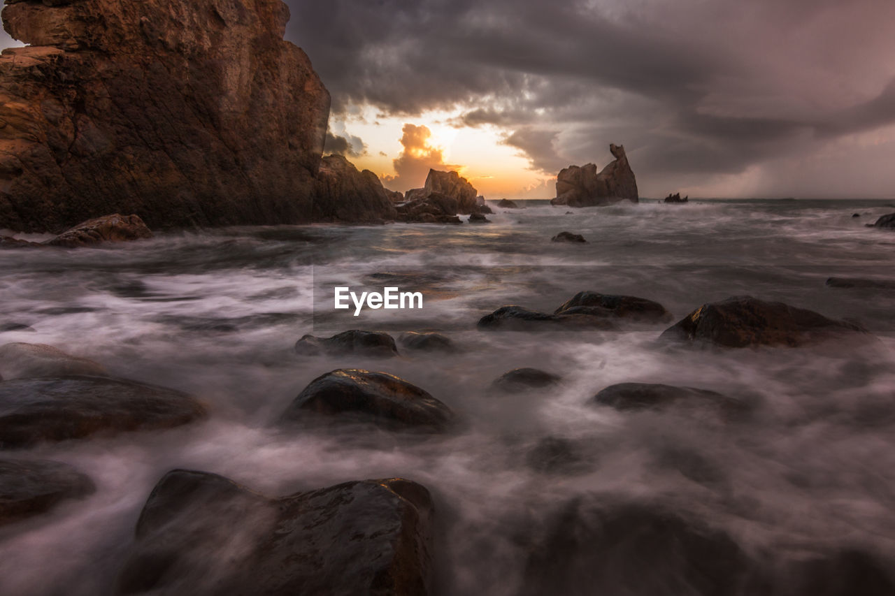 Scenic view of sea against sky during sunset