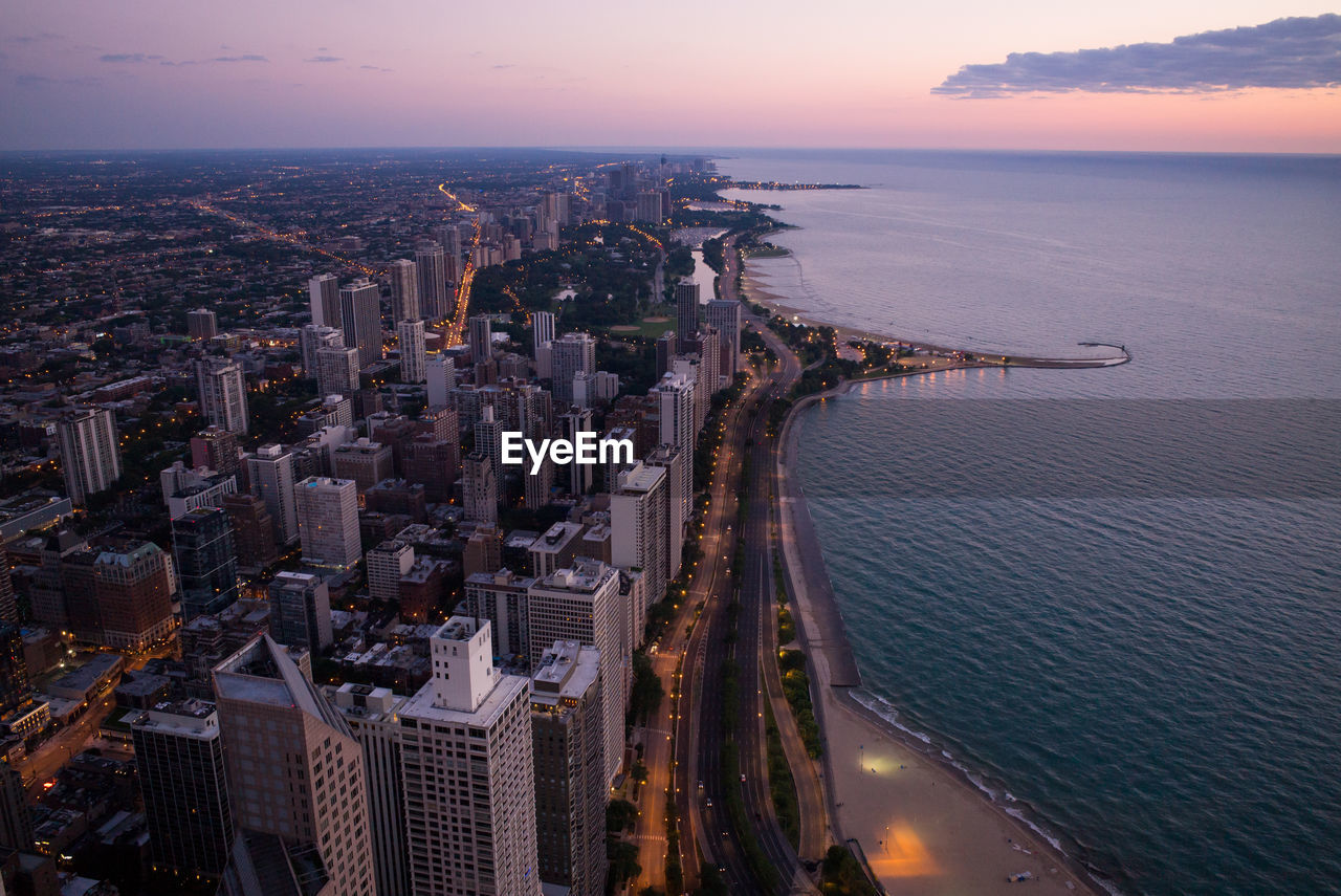 High angle view of city buildings at waterfront