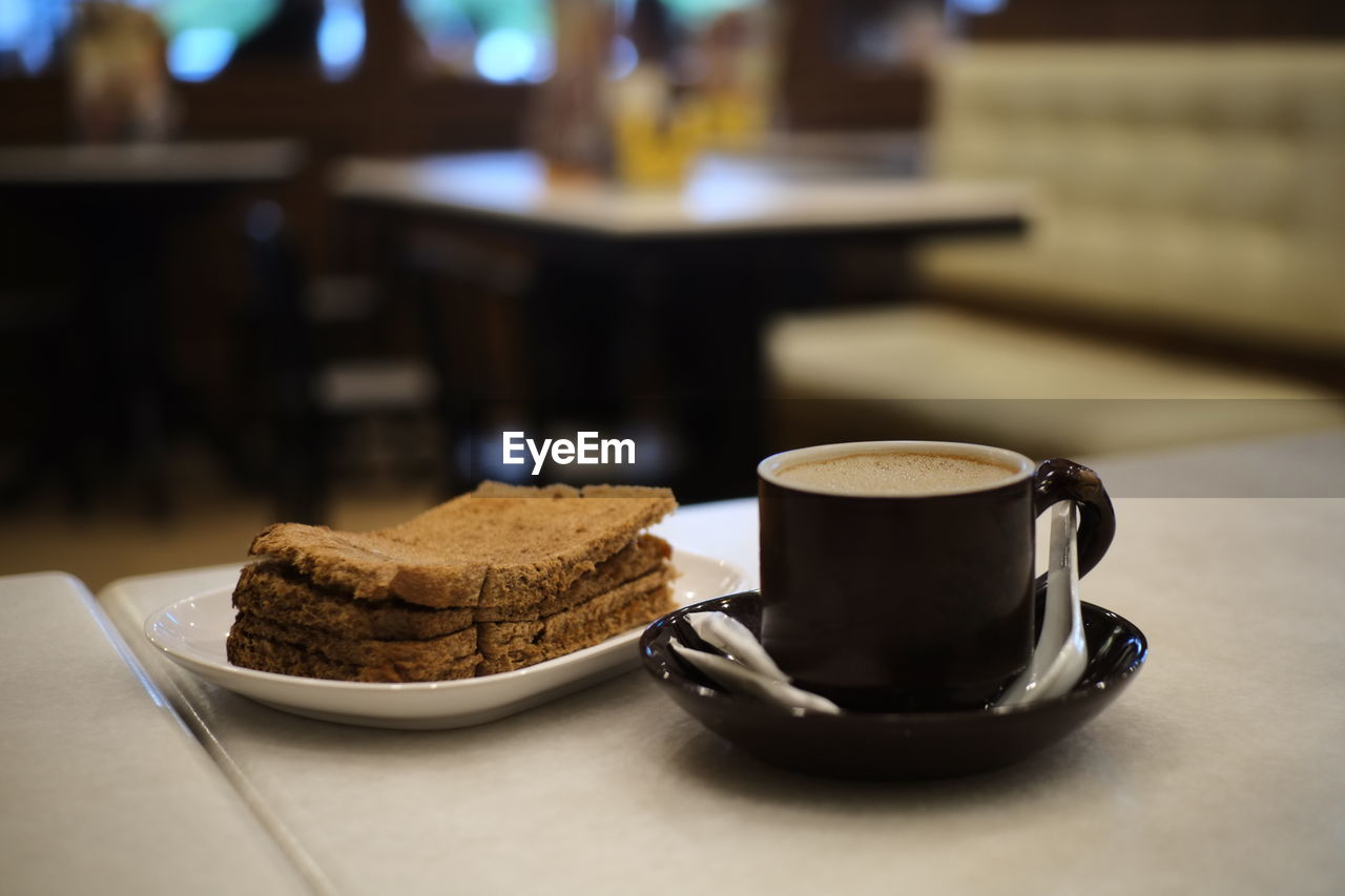 Close-up of breakfast served on table