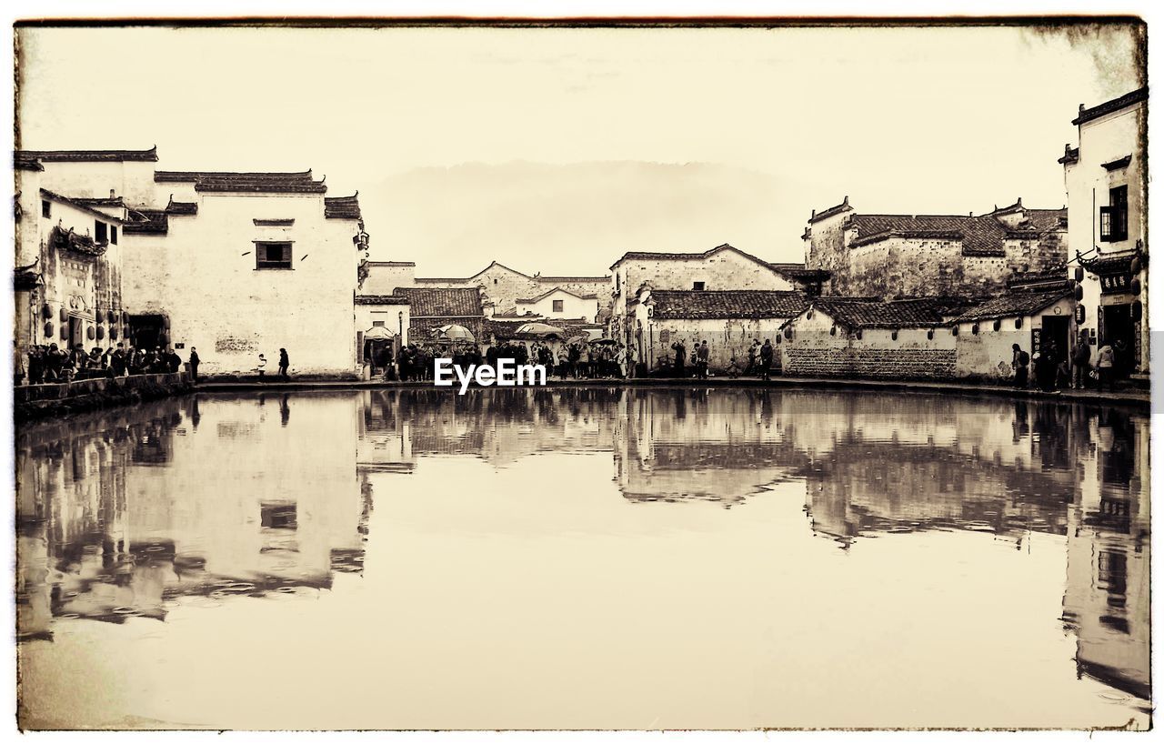 REFLECTION OF CITY ON WATER