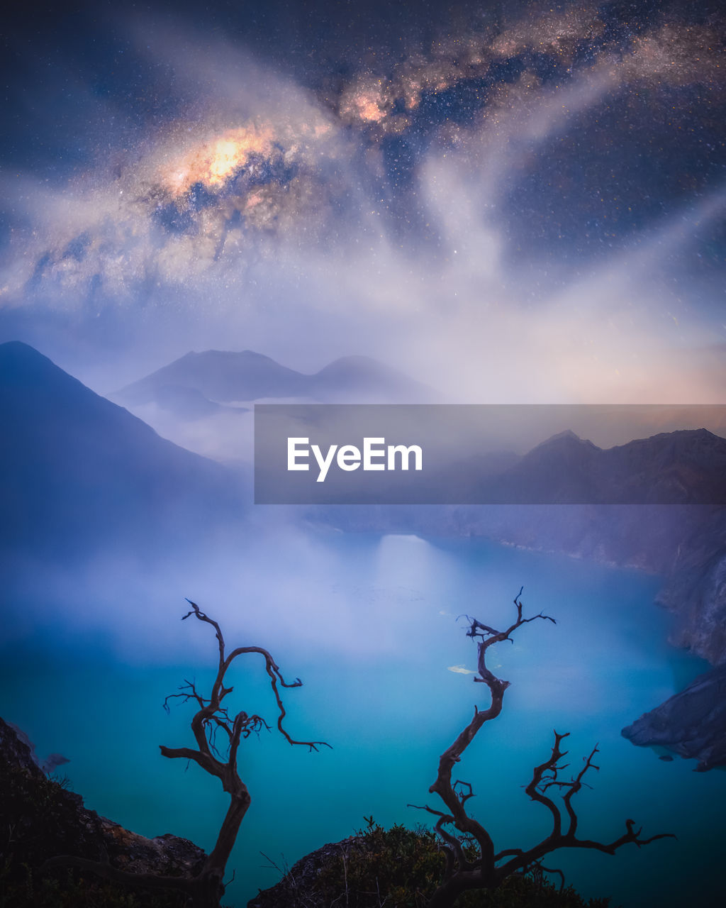 Milky way over blue crater volcano