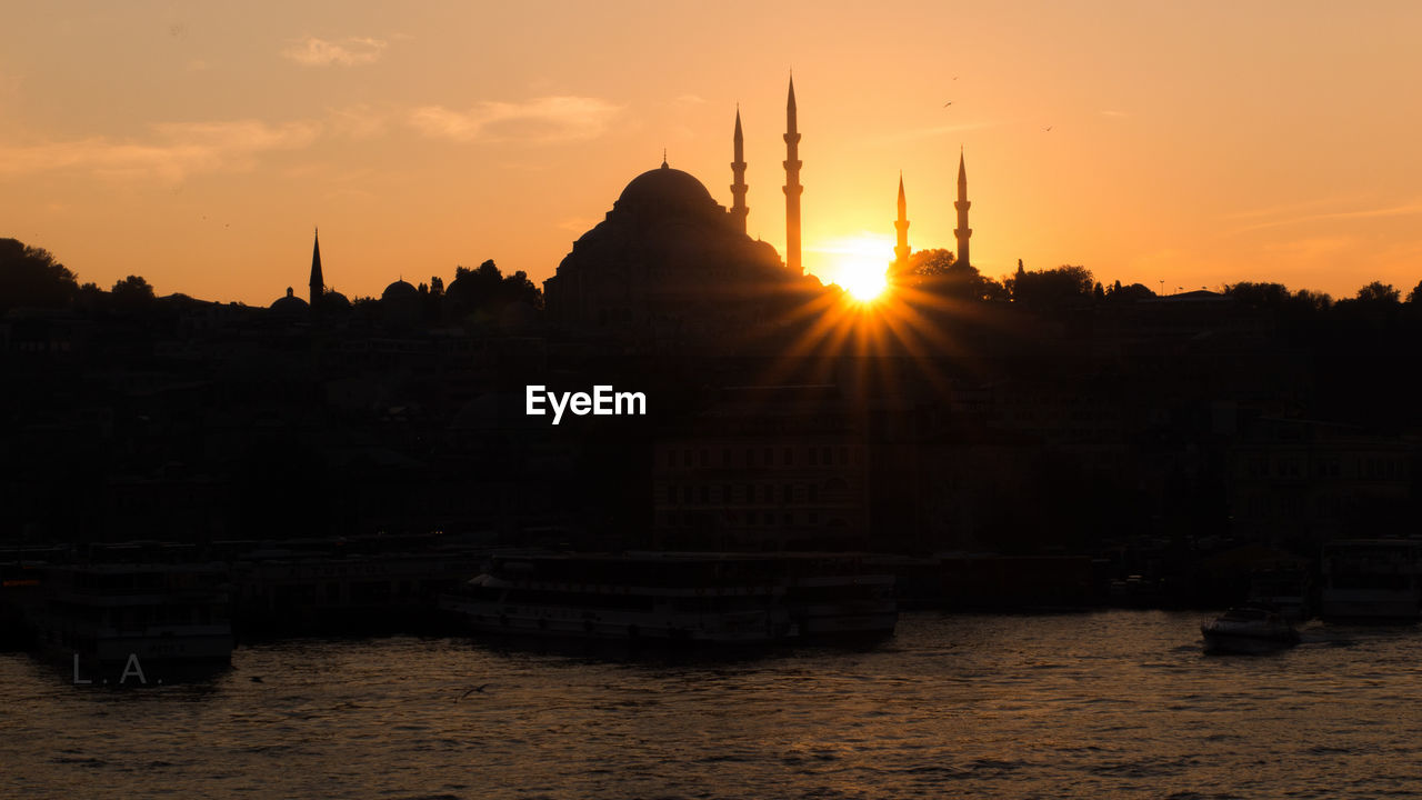 Silhouette suleymaniye mosque against sky during sunset