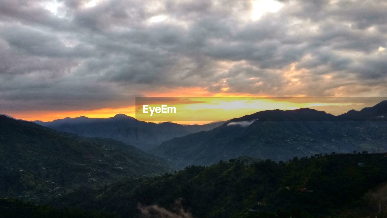 SCENIC VIEW OF DRAMATIC LANDSCAPE DURING SUNSET