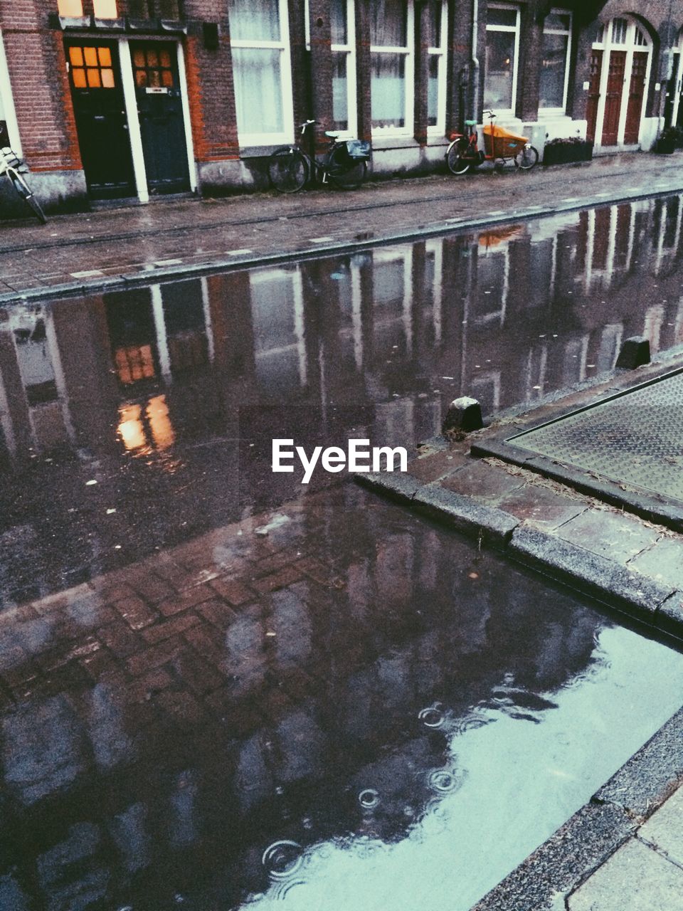 REFLECTION OF BUILDINGS ON WATER