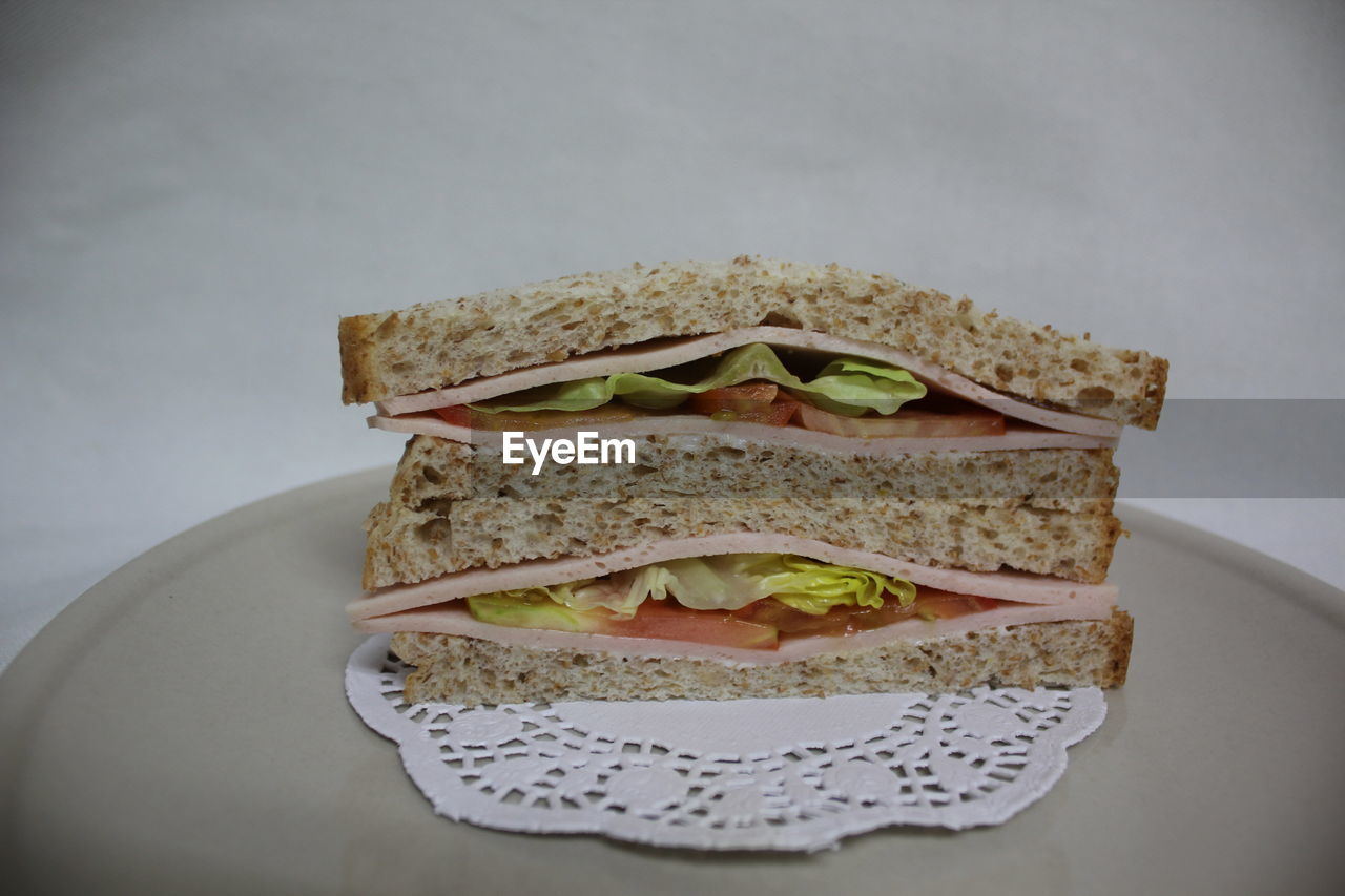 Close-up of sandwich in plate on table