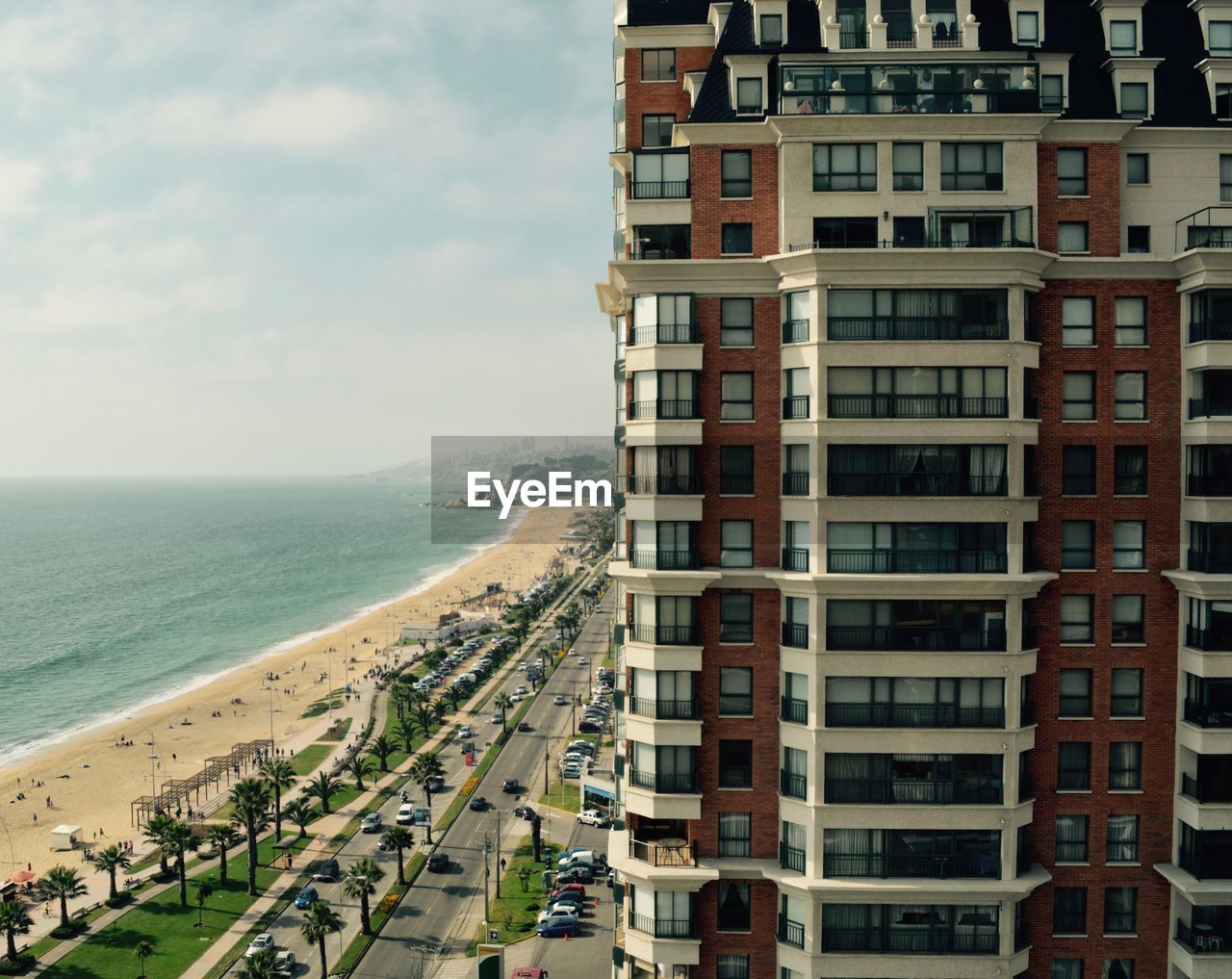 Panoramic view of beach against sky in city