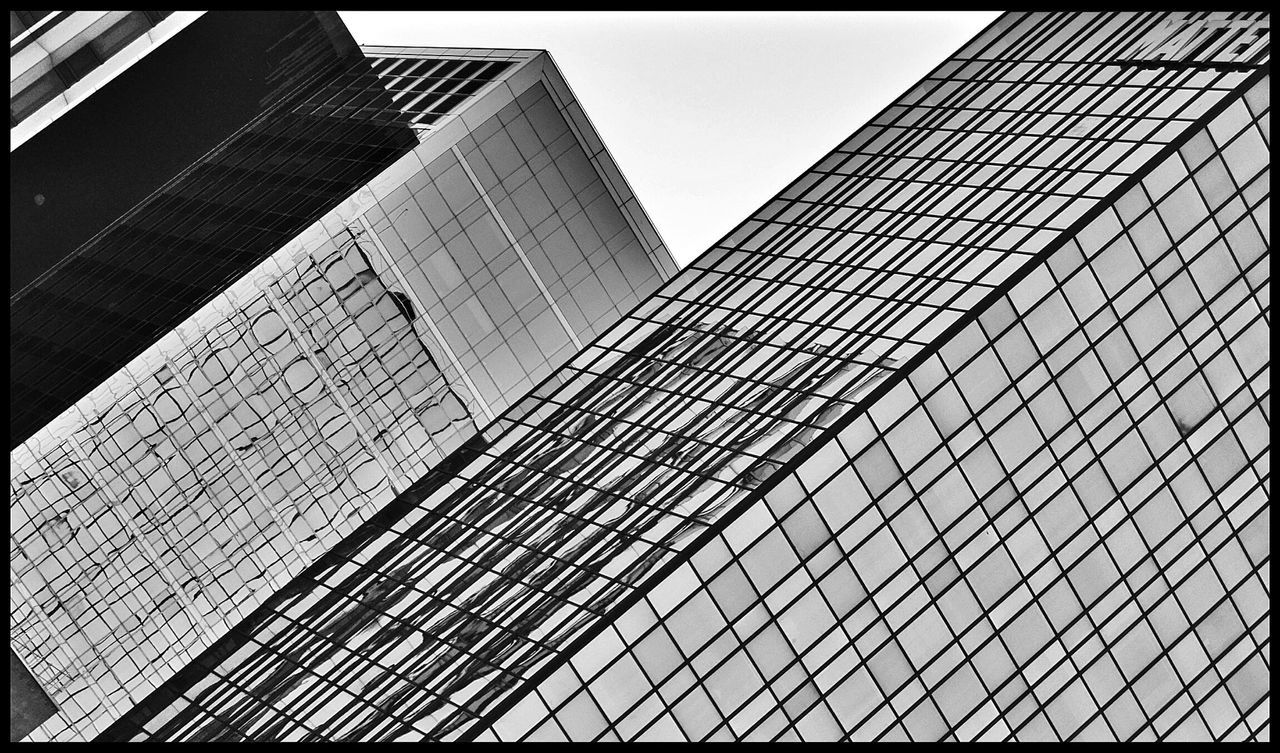 Low angle view of built structures against clear sky