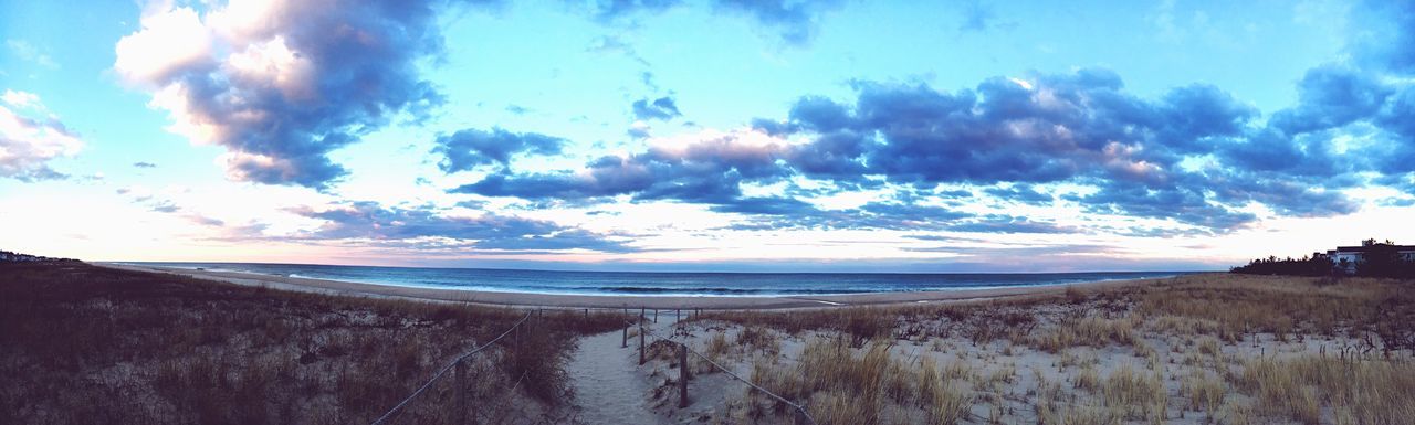 PANORAMIC SHOT OF BEACH AGAINST SKY