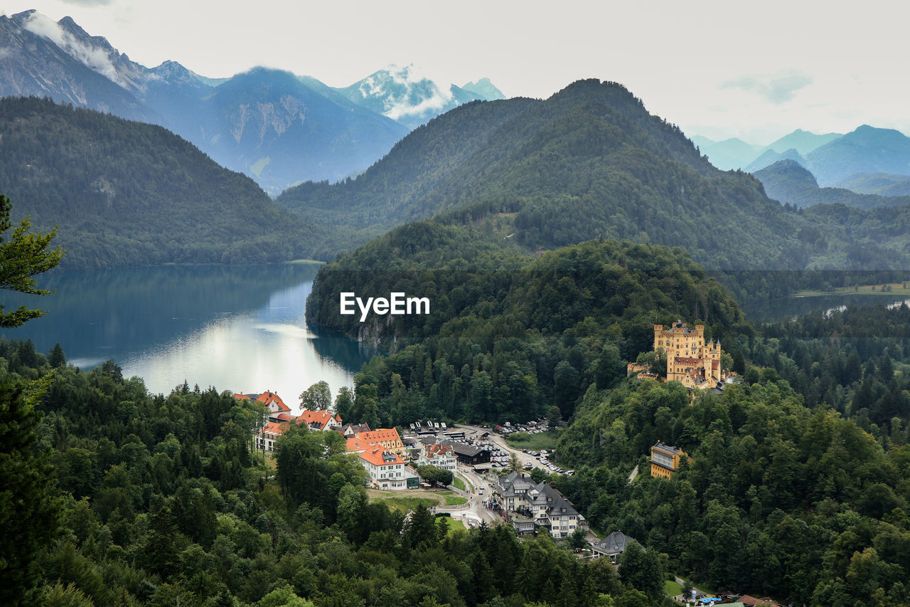 Hohenschwangau castle
scenic view of townscape by mountains against sky 
