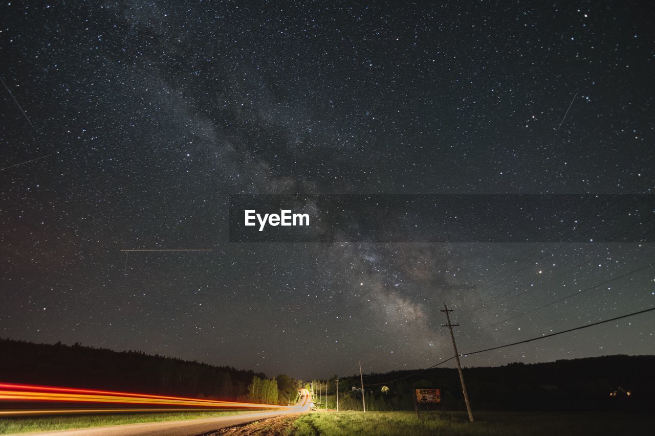 Scenic view of star field against sky at night