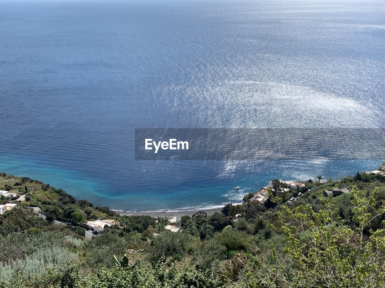 High angle view of sea against mountain