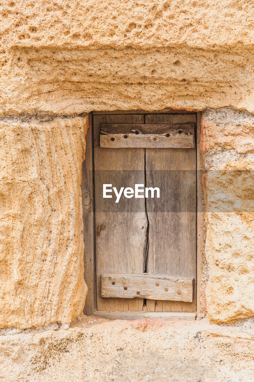 CLOSED DOOR OF OLD BUILDING