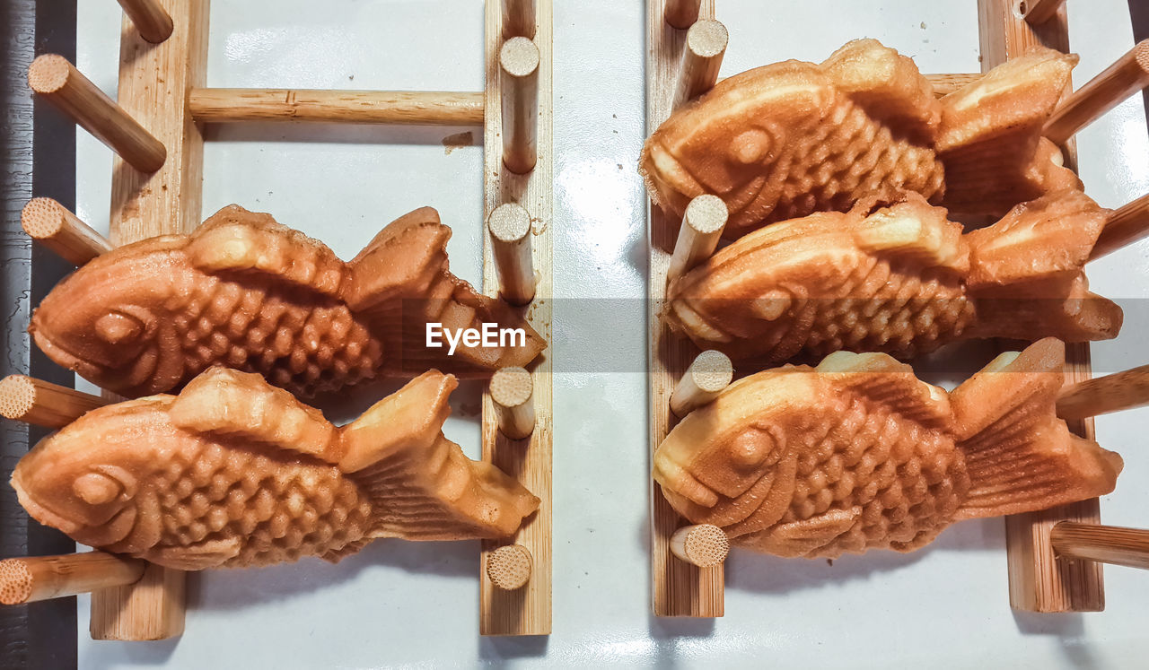 High angle view of fish shape decoration on table