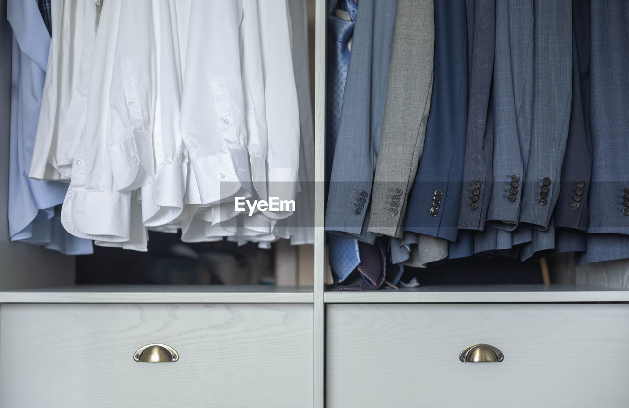 close-up of clothes hanging on rack