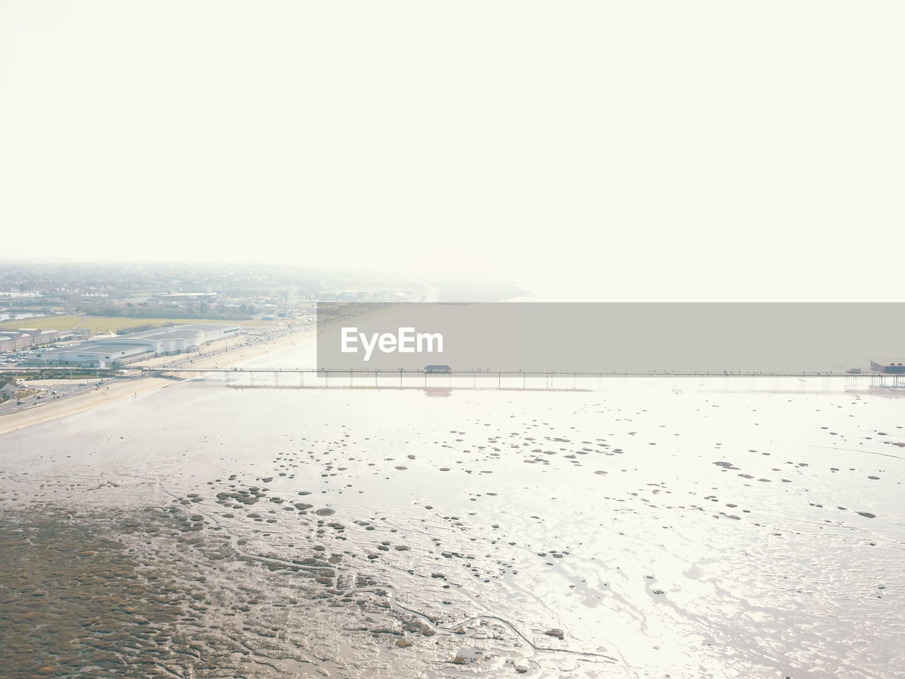 SCENIC VIEW OF BEACH AGAINST CLEAR SKY DURING WINTER