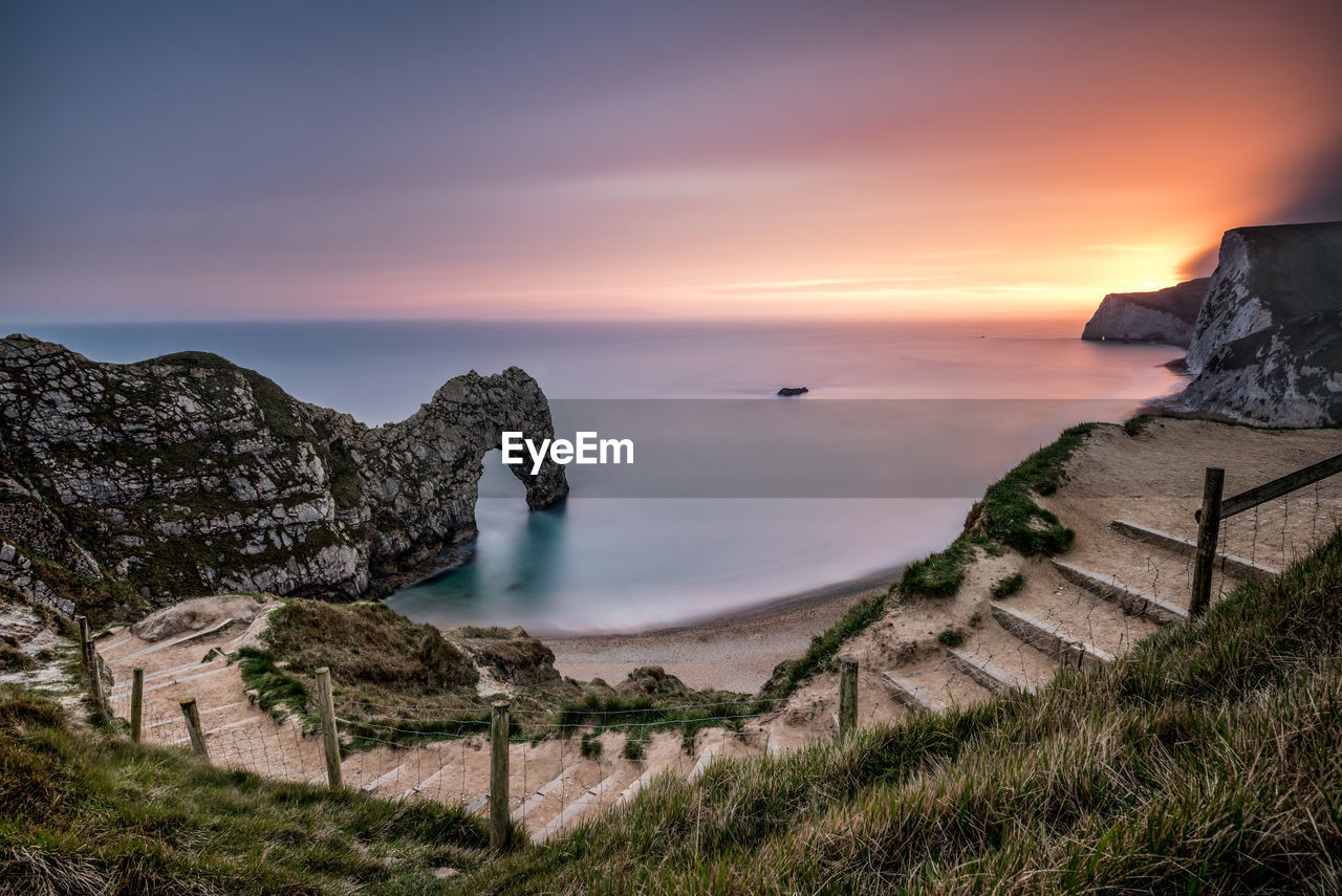Scenic view of sea against sky during sunset