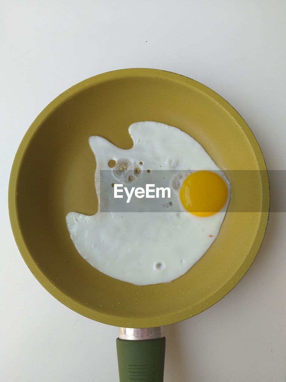 High angle view of breakfast on table,pan and egg