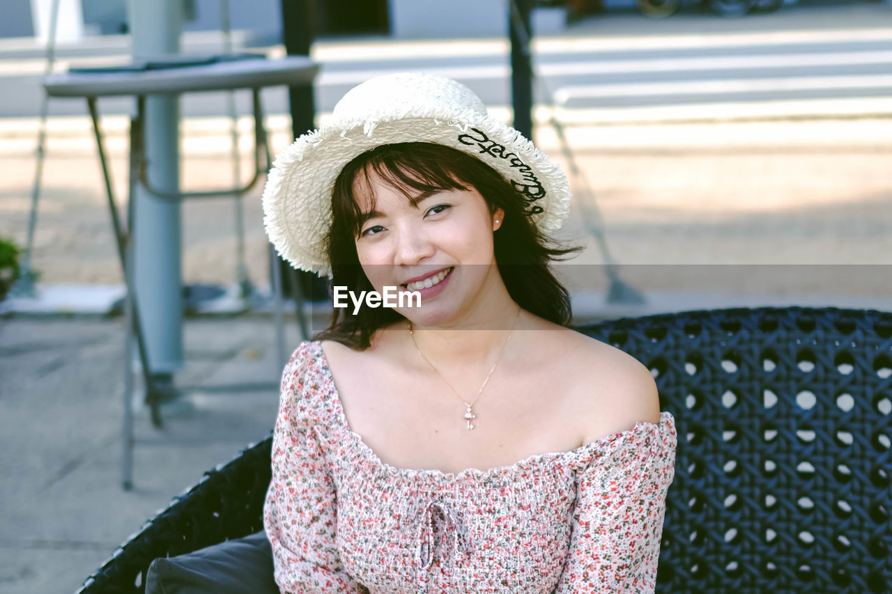 Portrait of smiling young woman