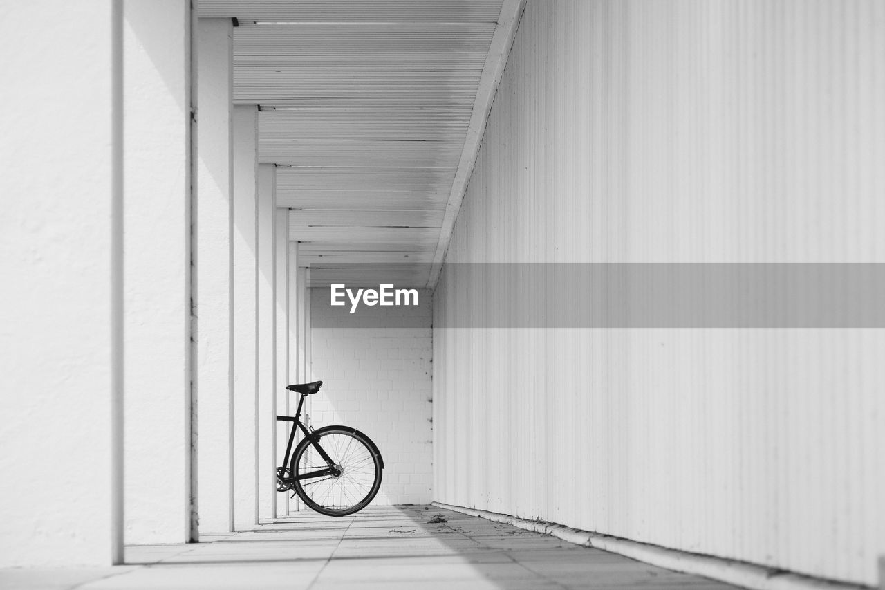 Cropped image of bicycle on corridor