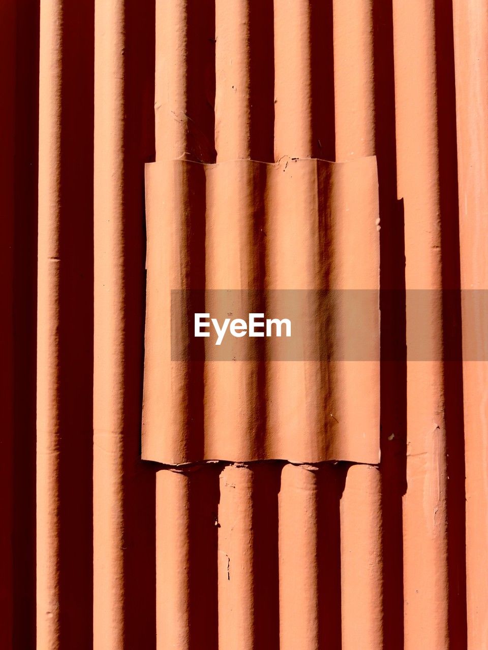 full frame, pattern, backgrounds, interior design, no people, line, wood, window covering, close-up, repetition, architecture, in a row, striped, day, wall, sunlight, built structure, side by side, outdoors, brown, metal, orange color