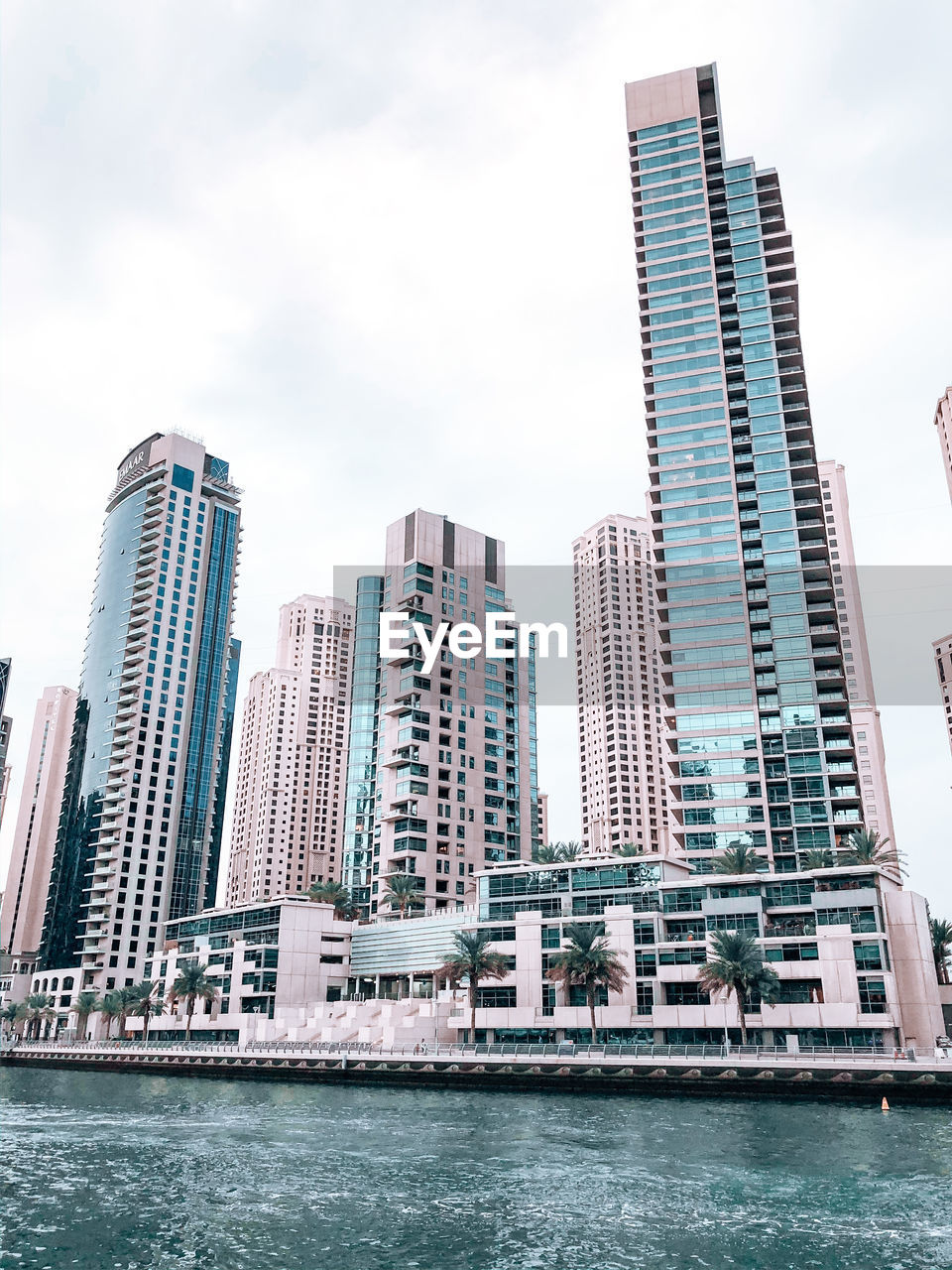 Modern buildings in city against sky