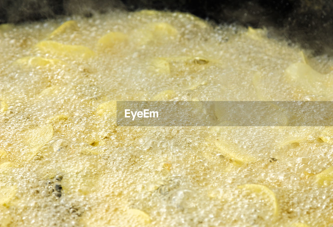 Traditional frying potatoes in a craftsman image.