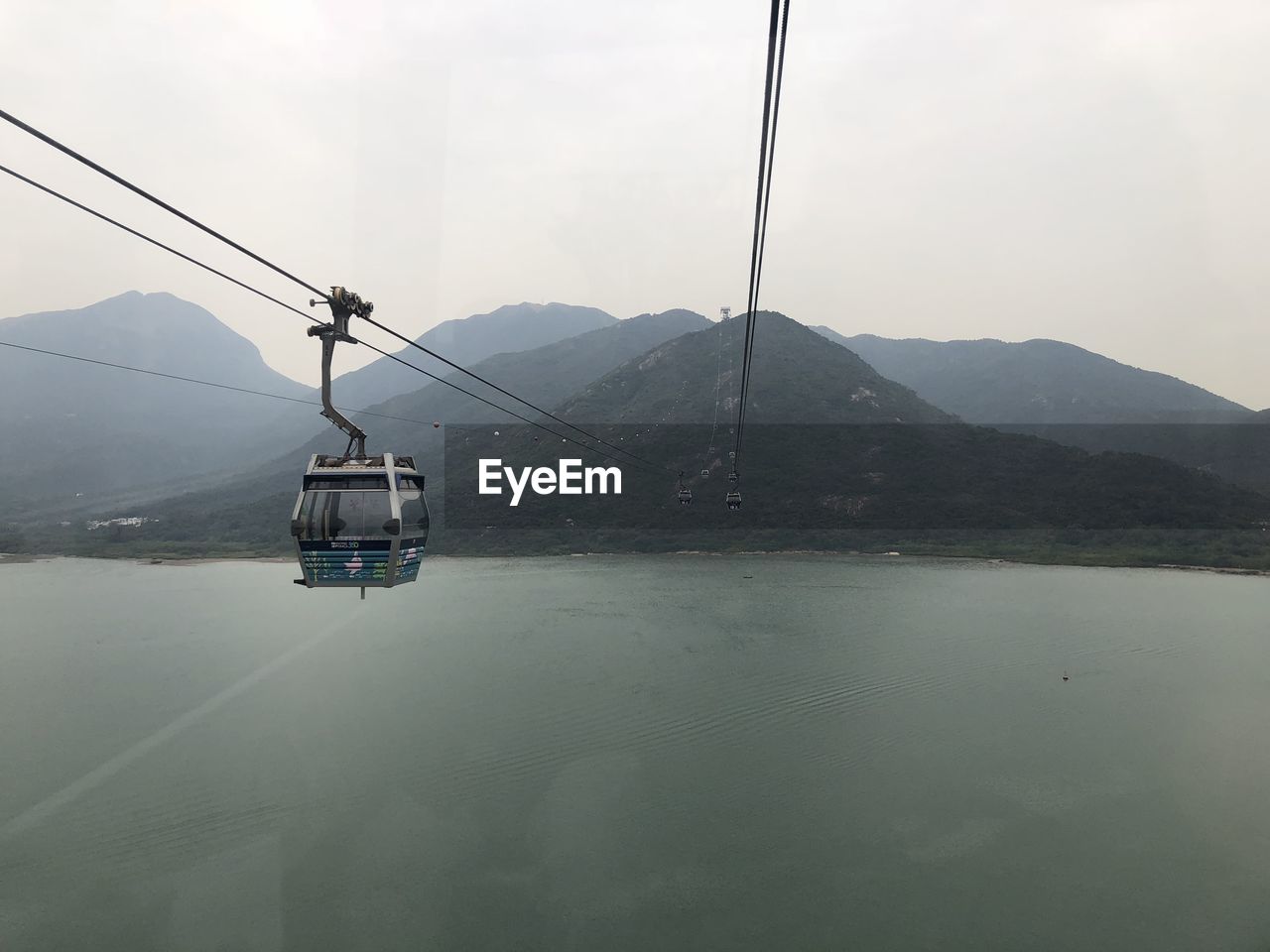 OVERHEAD CABLE CAR IN MOUNTAINS