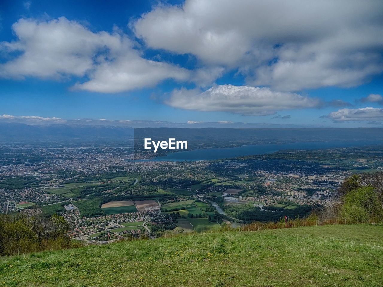 Aerial view of landscape against cloudy sky