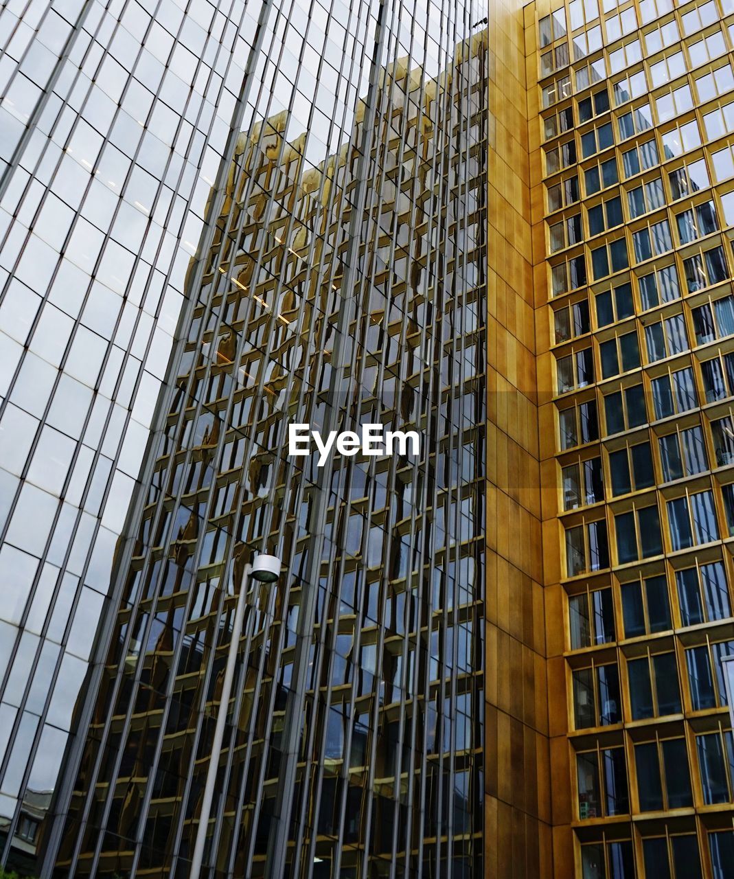 Low angle view of modern building against sky