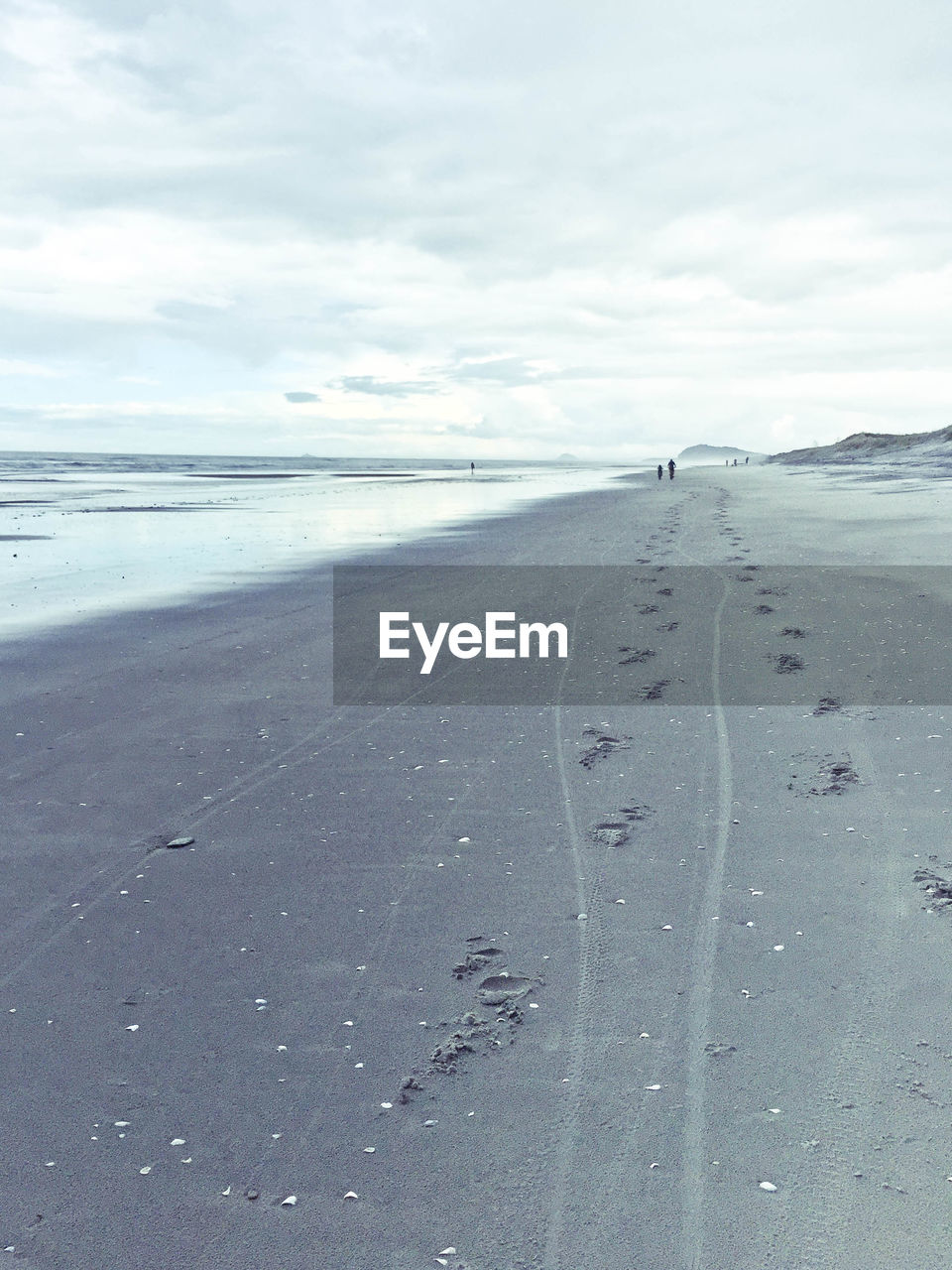 BEACH AGAINST SKY