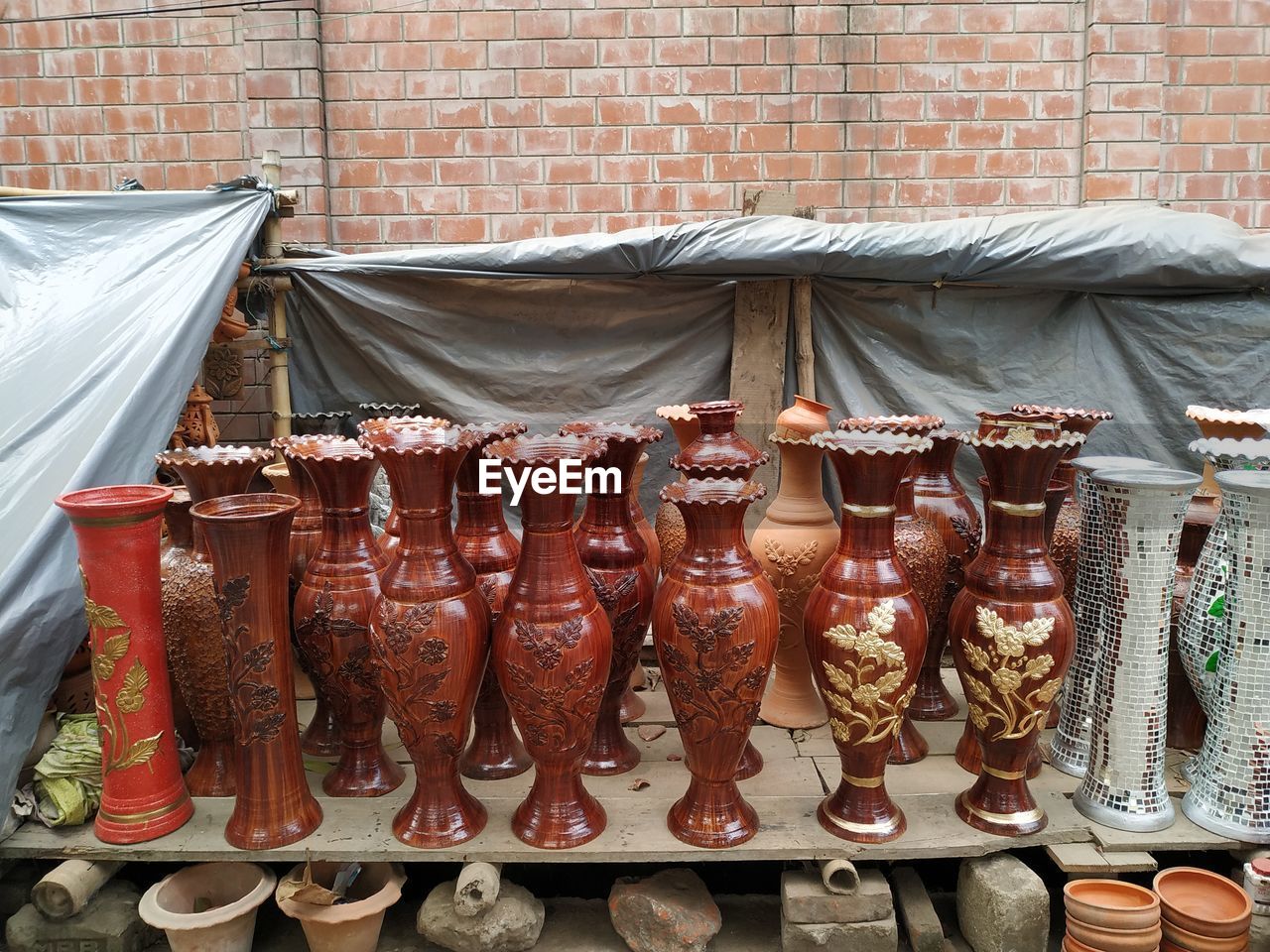 Designed pots for sale at market stall