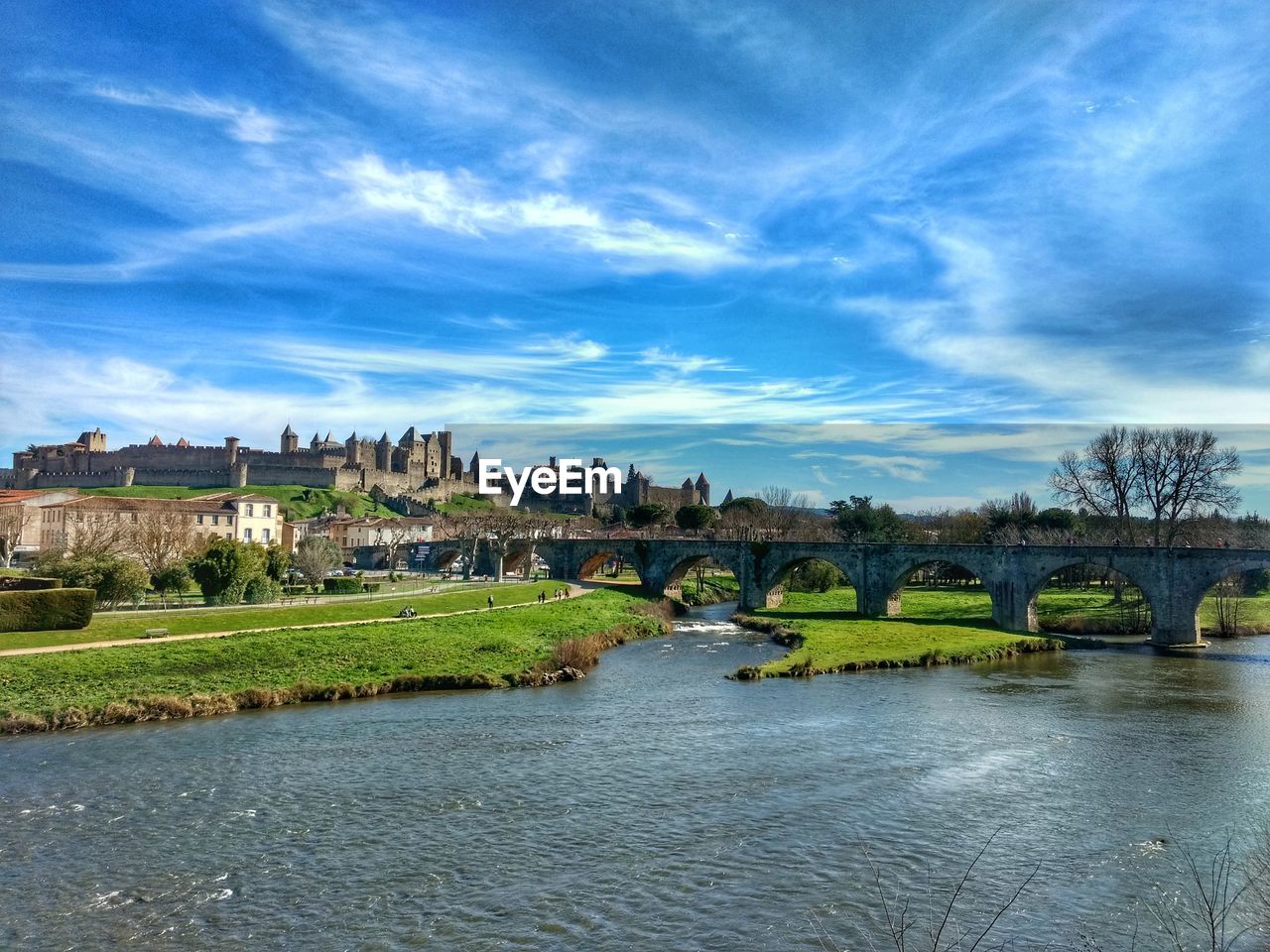 SCENIC VIEW OF RIVER AGAINST BLUE SKY