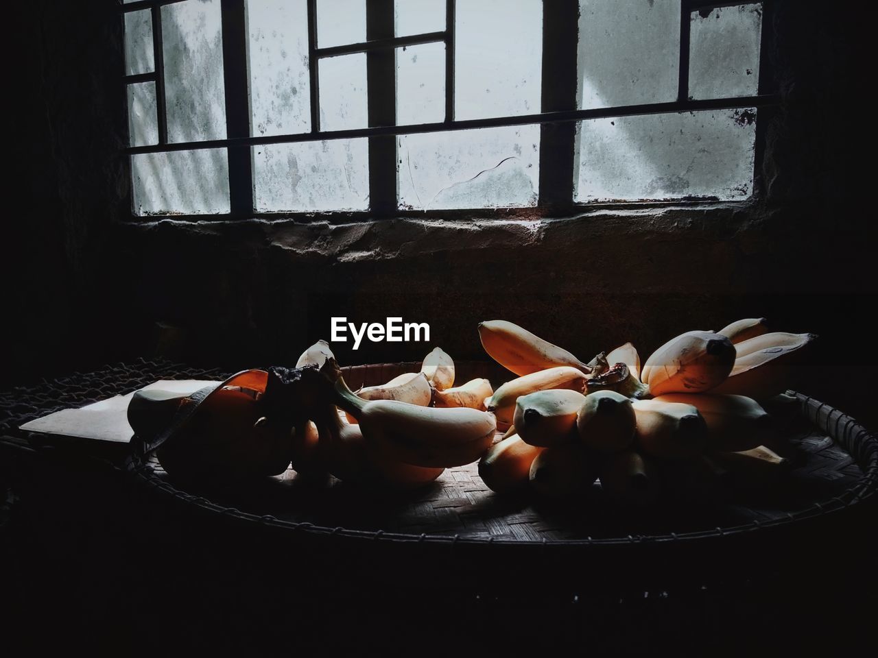 CLOSE-UP OF FRUIT ON WINDOW SILL