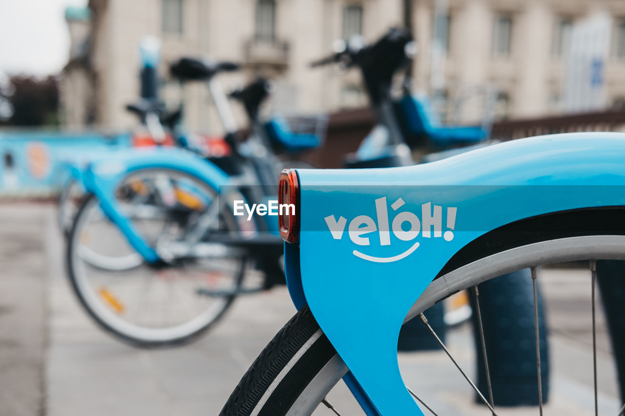 CLOSE-UP OF BICYCLE ON CITY STREET