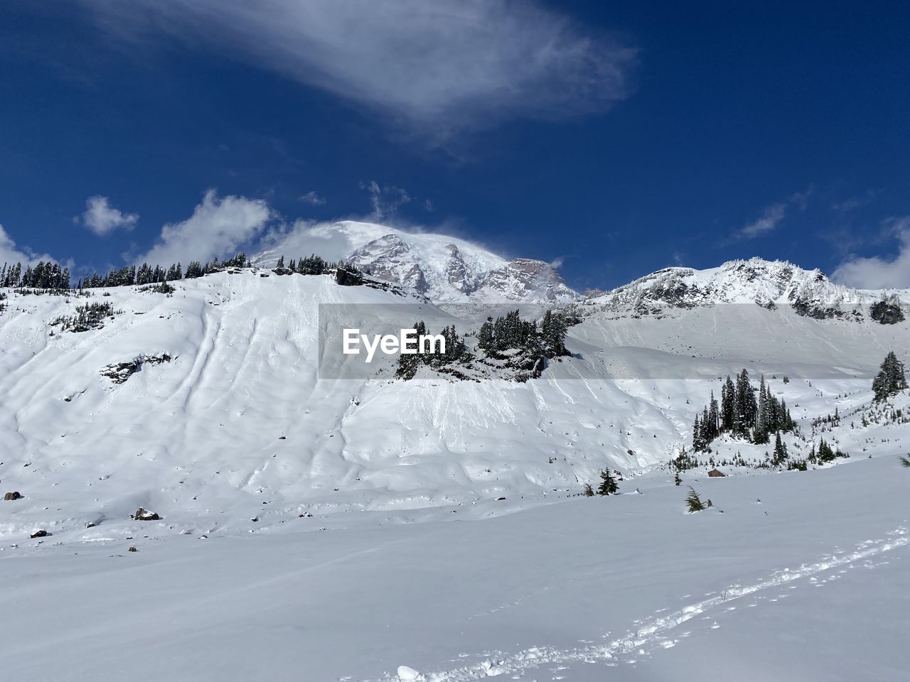 snow, winter, cold temperature, scenics - nature, mountain, environment, landscape, mountain range, beauty in nature, sky, nature, piste, ski touring, cloud, snowcapped mountain, tranquil scene, tranquility, ski mountaineering, white, travel, land, ski equipment, winter sports, travel destinations, non-urban scene, blue, skiing, day, ski, resort, frozen, tree, forest, coniferous tree, outdoors, tourism, idyllic, vacation, holiday, sports, pine tree, pinaceae, plant, trip, sunlight