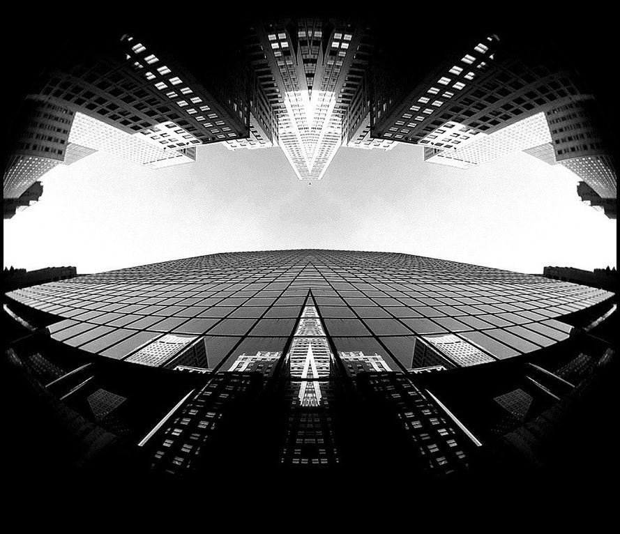Directly below shot of skyscrapers against sky