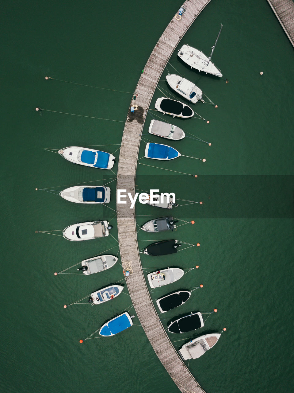 Top view of yachts in the harbor, aerial shoot with drone. concept of tourism and recreation.