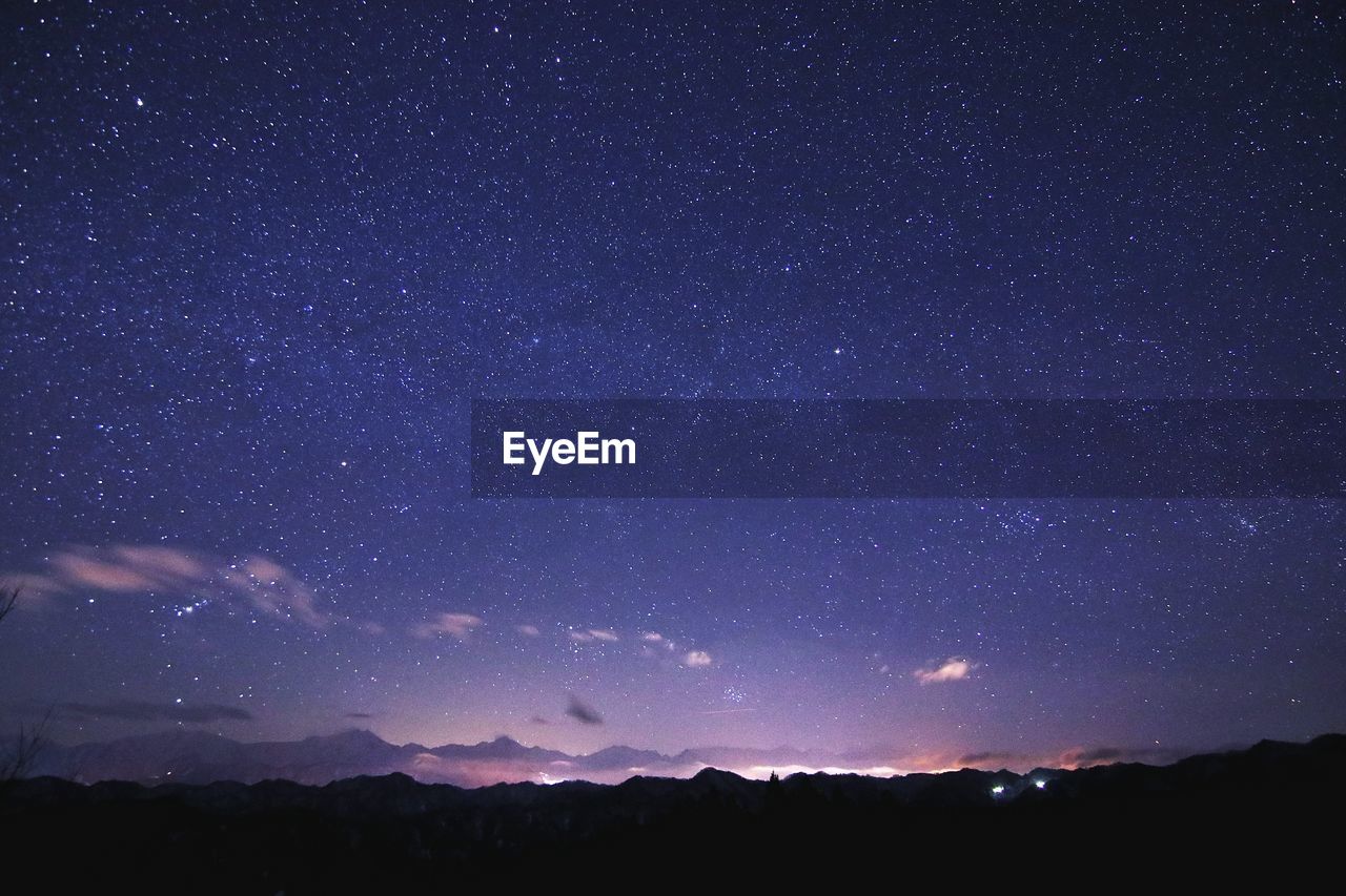 Low angle view of star field against sky at night