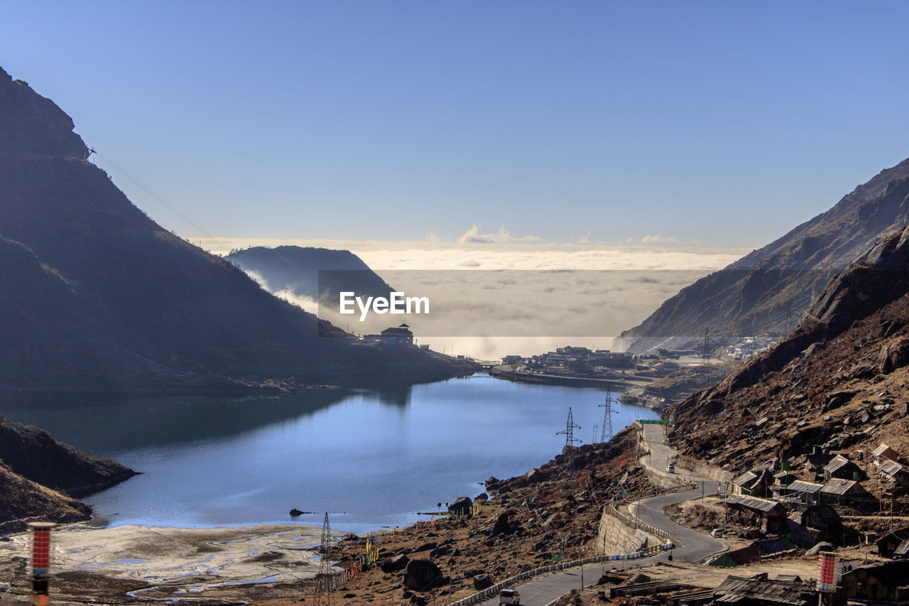 Panoramic view of lake and mountains against sky