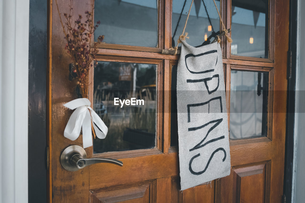 TEXT ON GLASS WINDOW AT HOME