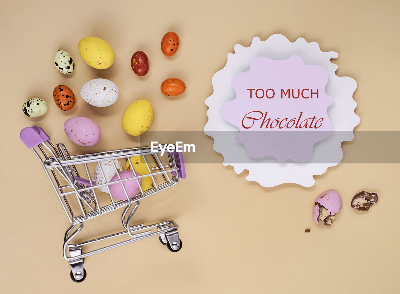 shopping cart, food, studio shot, food and drink, consumerism, no people, indoors, shopping, retail, communication, colored background, text, cartoon