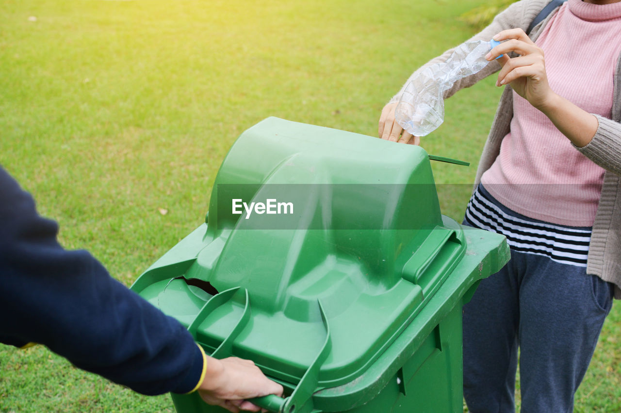 People cleaning park