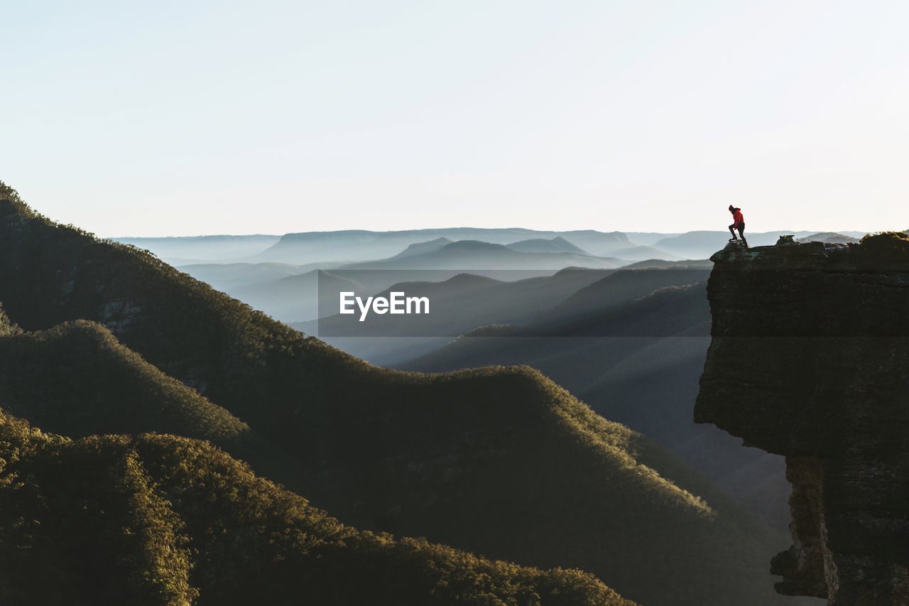 Person standing on cliff